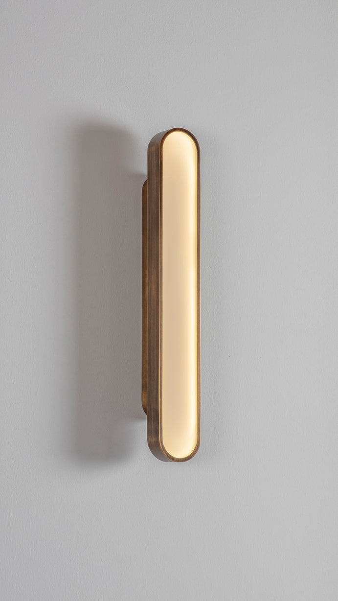 CAPSULE BRUSHED BRASS WALL LIGHT
