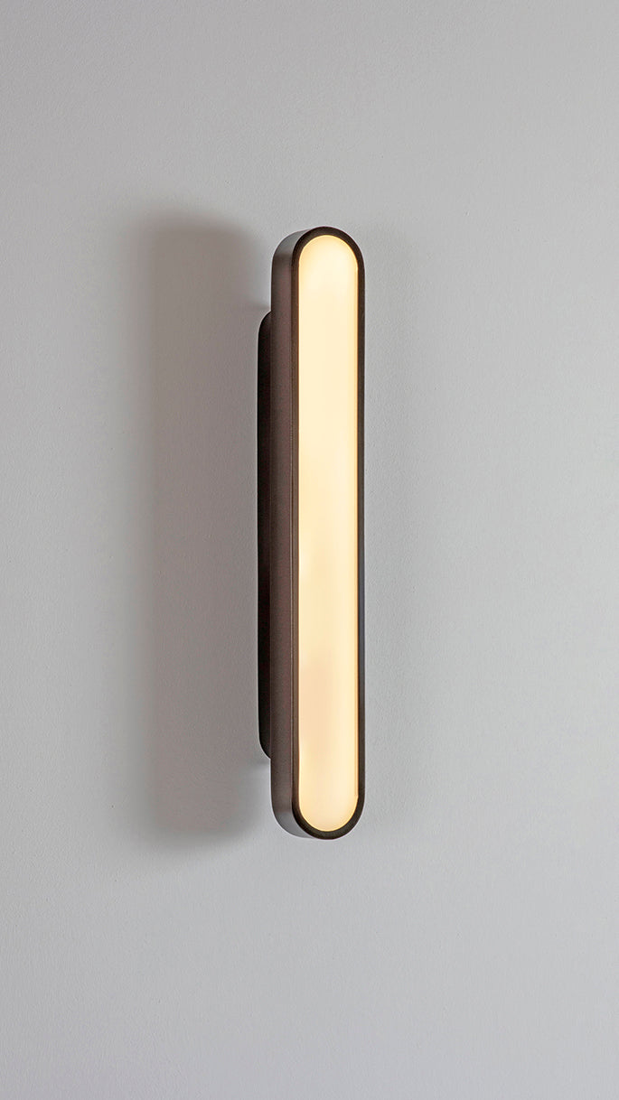 CAPSULE DARK BRONZE WALL LIGHT