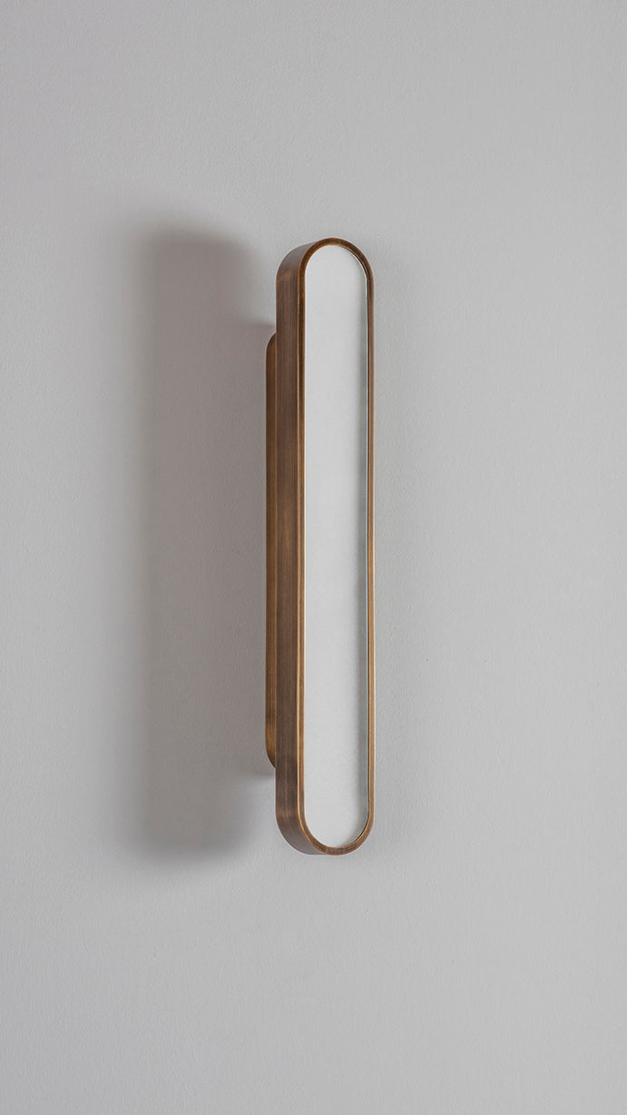 CAPSULE BRUSHED BRASS WALL LIGHT